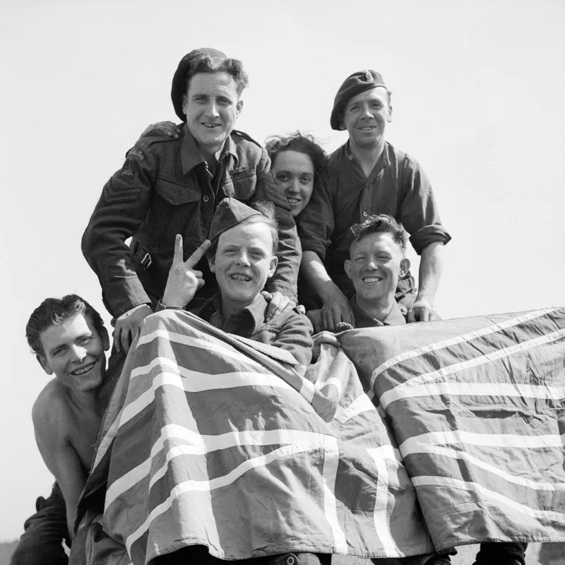 British prisoners of war cheer their liberation at Stalag 11B, Fallingbostel, April 1945