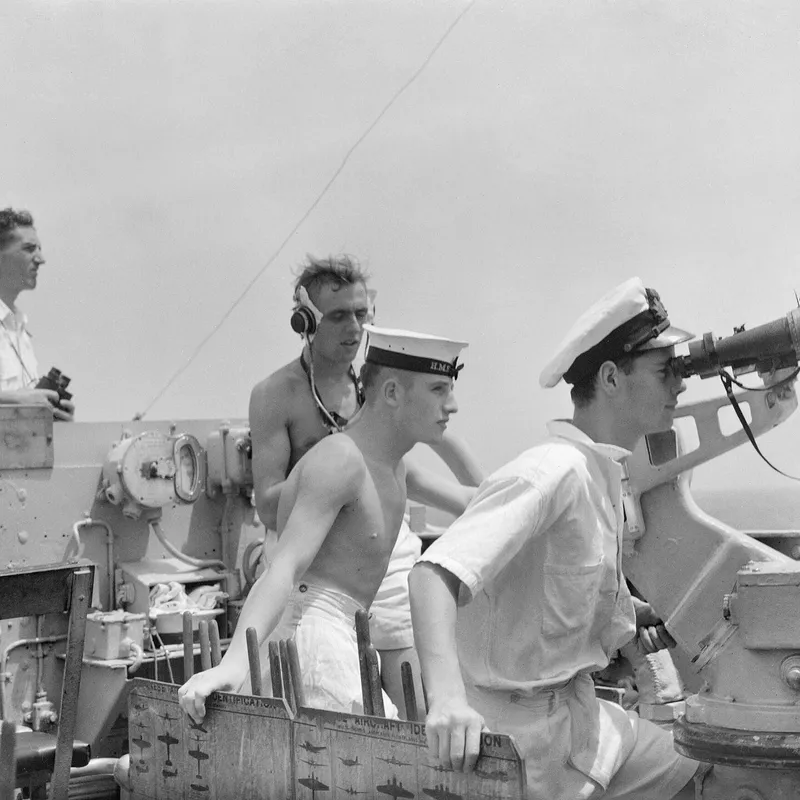 Sailors keep watch on the bridge of HMS Warspite during an exercise with the Eastern Fleet